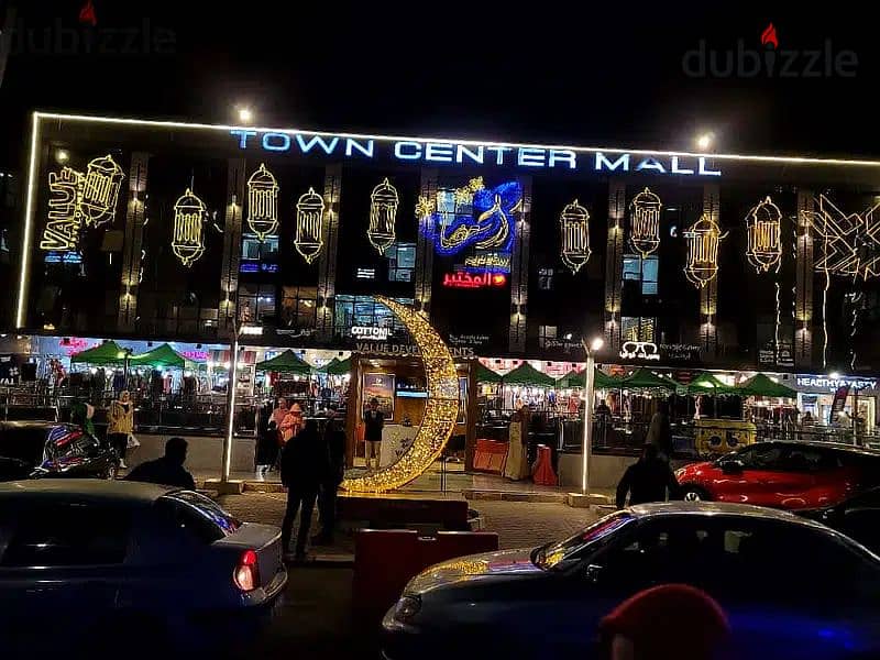 The last shop, first floor, finished, directly on the facade, in the strongest mall in Shorouk, Town Center Mall, with the highest traffic, in front o 10