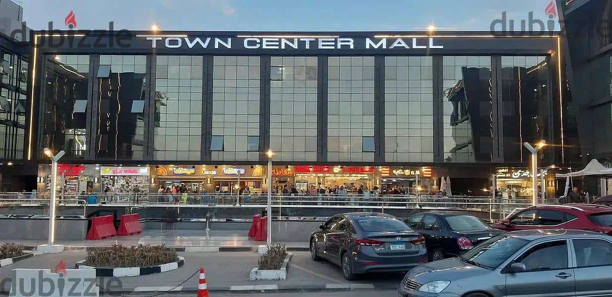 The last shop, first floor, finished, directly on the facade, in the strongest mall in Shorouk, Town Center Mall, with the highest traffic, in front o 16