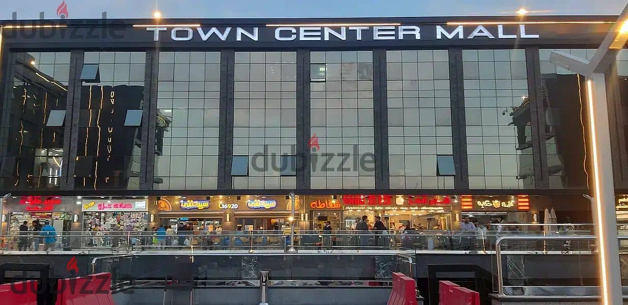 The last shop, first floor, finished, directly on the facade, in the strongest mall in Shorouk, Town Center Mall, with the highest traffic, in front o 17