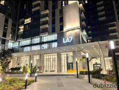 Apartment for sale 14th floor furnished first use Aeon Towers Compound marakez Sheikh Zayed