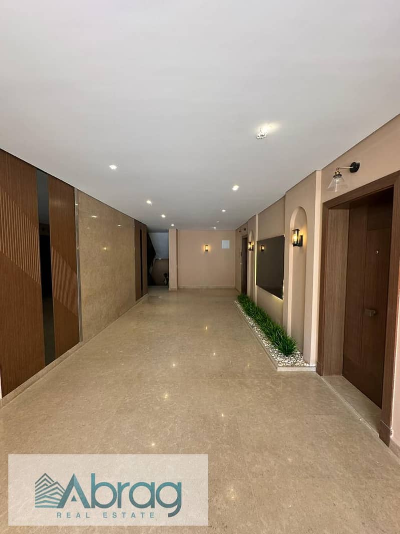 For sale apartment with finishing, installments, Village west Sheikh Zayed 2