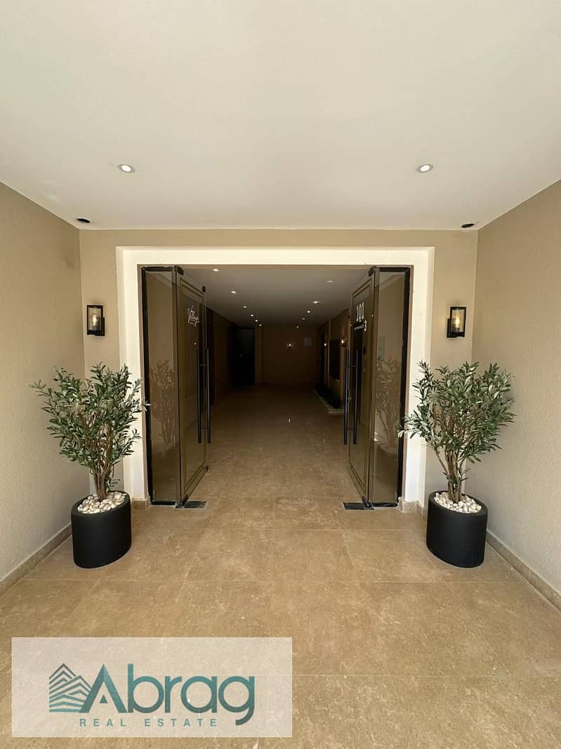 For sale apartment with finishing, installments, Village west Sheikh Zayed 3