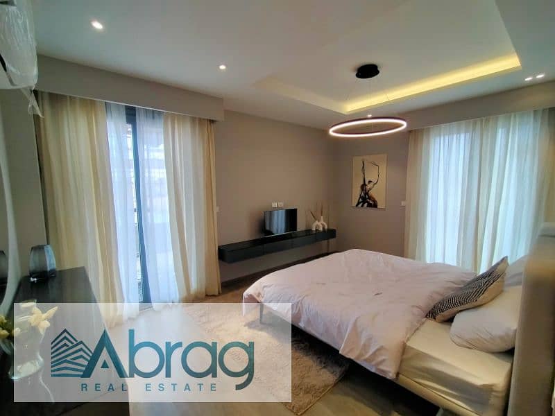 For sale apartment with finishing, installments, Village west Sheikh Zayed 10