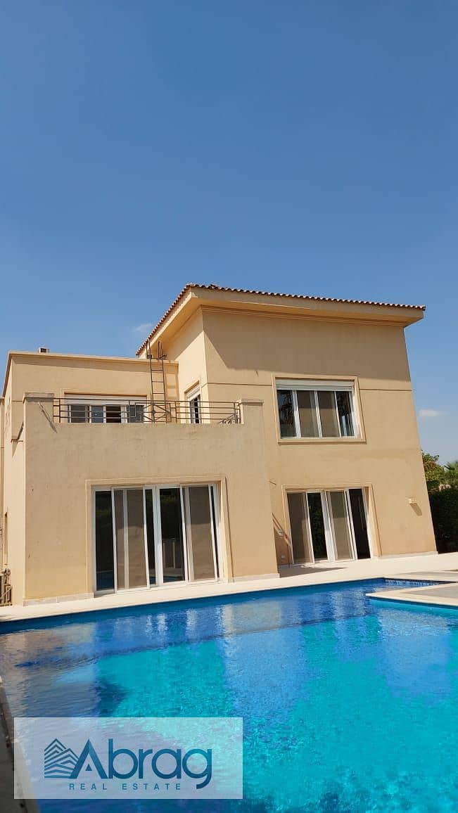 Corner villa for rent, with air conditioners and kitchen, with a swimming pool, in El Guezira Compound, Sheikh Zayed 2