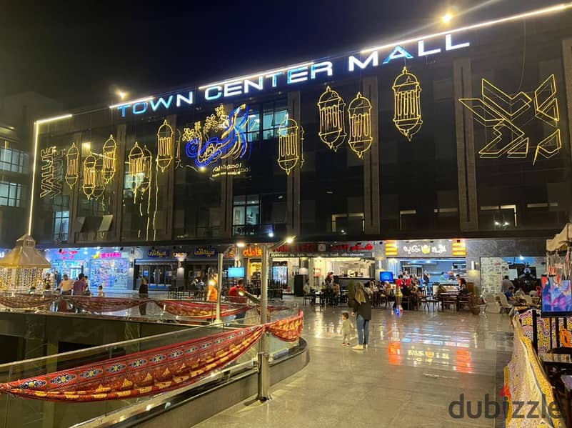 A 50-square-meter shop for immediate delivery, directly facing Town Center Mall, the most densely populated mall in El Shorouk 15