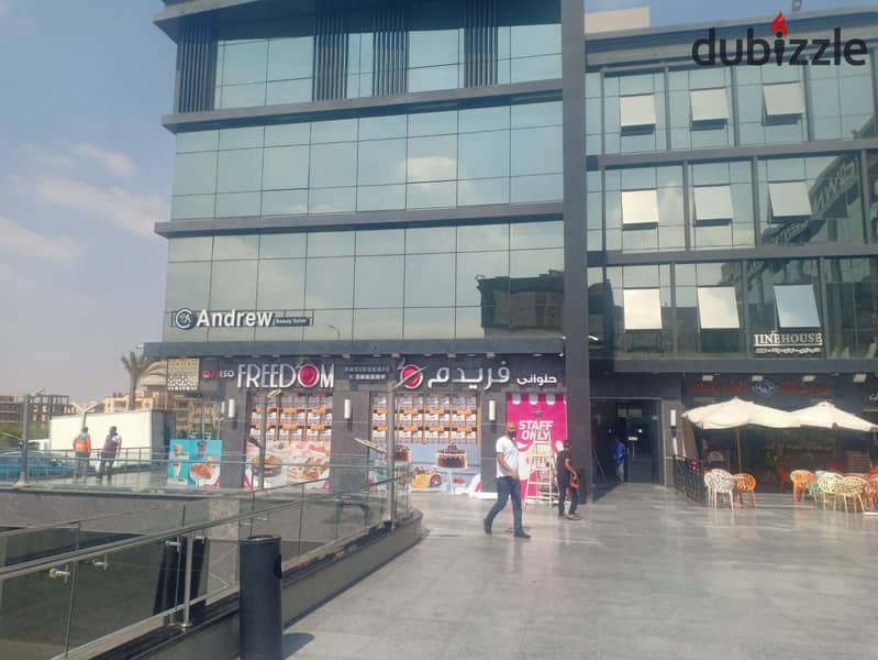 A 50-square-meter shop for immediate delivery, directly facing Town Center Mall, the most densely populated mall in El Shorouk 36