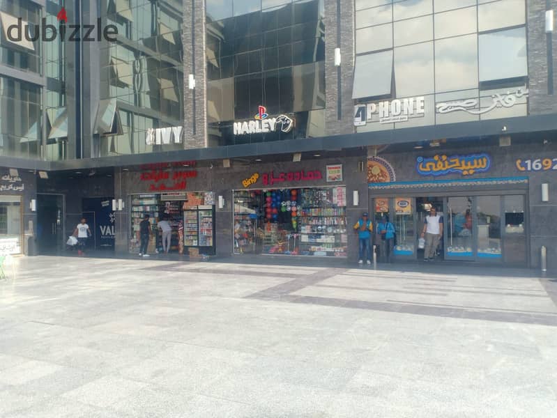 A 50-square-meter shop for immediate delivery, directly facing Town Center Mall, the most densely populated mall in El Shorouk 37