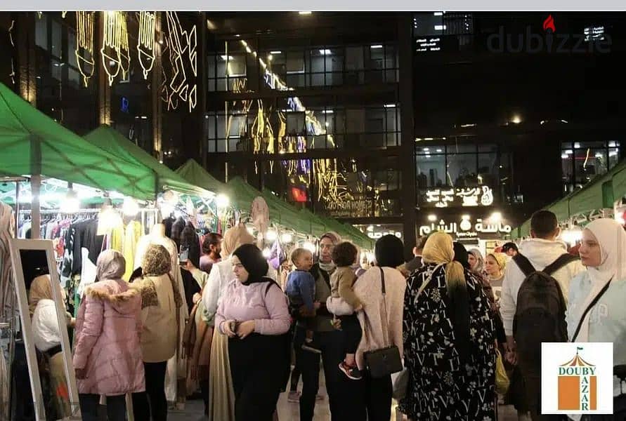 A 50-square-meter shop for immediate delivery, directly facing Town Center Mall, the most densely populated mall in El Shorouk 41