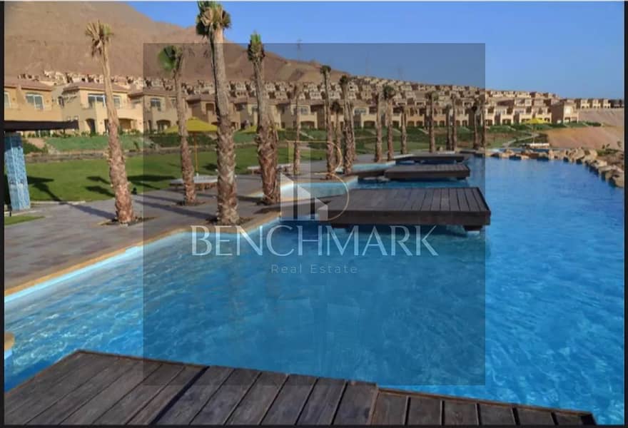 Chalet for sale, 100 square meters, ground floor with a garden in Telal Roya Village, Ain Sokhna, double view, installments over 8 years next to Porto 15