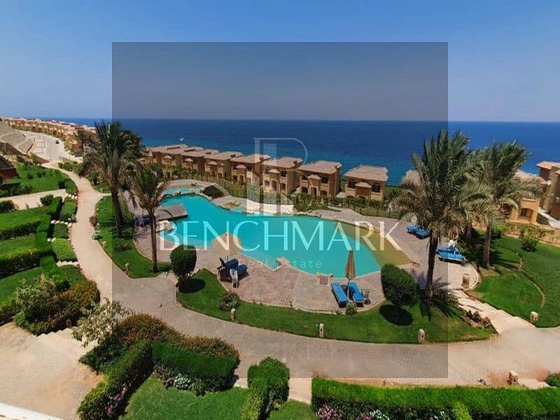 Chalet for sale, 100 square meters, ground floor with a garden in Telal Roya Village, Ain Sokhna, double view, installments over 8 years next to Porto 18