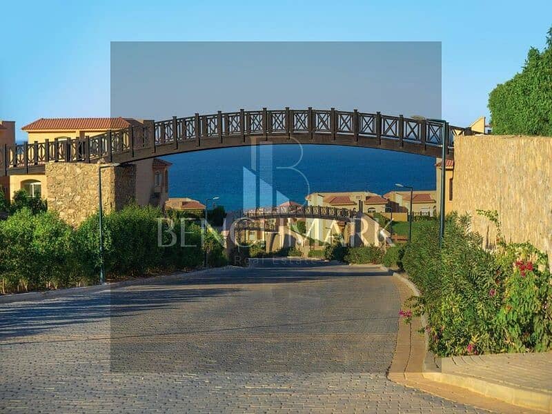 Chalet for sale, 100 square meters, ground floor with a garden in Telal Roya Village, Ain Sokhna, double view, installments over 8 years next to Porto 19