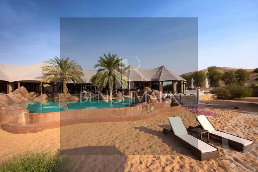 Chalet for sale, 100 square meters, ground floor with a garden in Telal Roya Village, Ain Sokhna, double view, installments over 8 years next to Porto 20