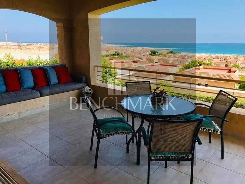 Chalet for sale, 100 square meters, ground floor with a garden in Telal Roya Village, Ain Sokhna, double view, installments over 8 years next to Porto 26