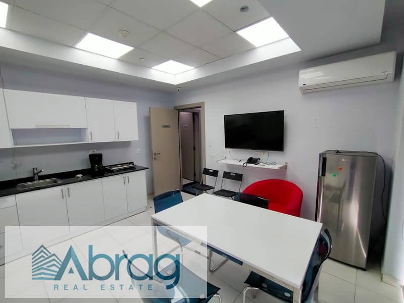 Administrative headquarters for rent in Sheikh Zayed Mall, The Courtyard, fully finished and furnished 9