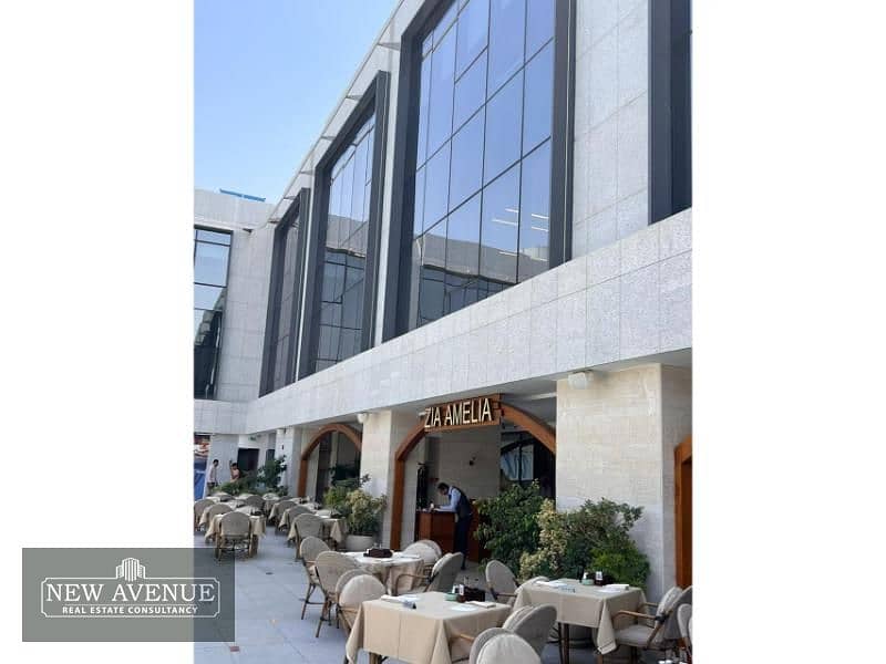 مكتب تشطيب كامل بـالتكييفات للإيجار في يو فينيوز القاهره الجديده AL/S 95          U-Venues New Cairo 1