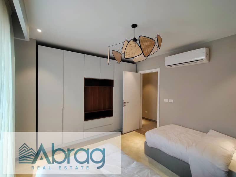 For sale, a two-bedroom apartment, ready for delivery soon, in Sheikh Zayed, finished with air conditioners, old price, Village West Compound 1