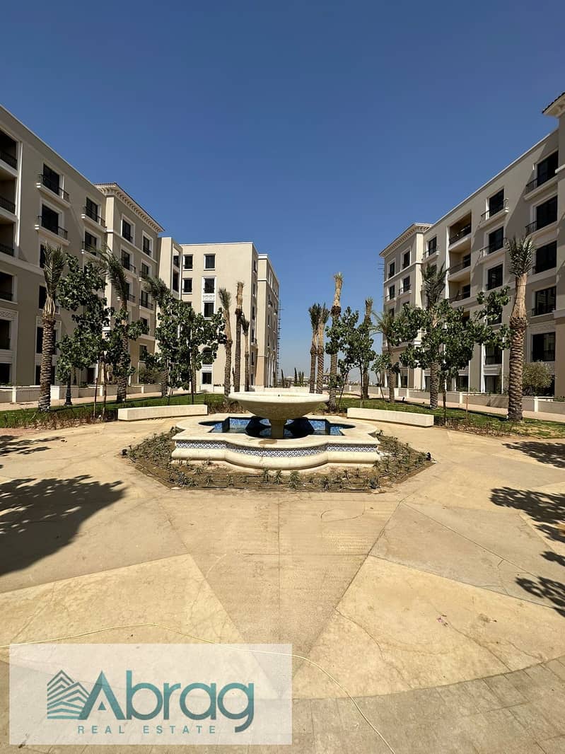 For sale, a two-bedroom apartment, ready for delivery soon, in Sheikh Zayed, finished with air conditioners, old price, Village West Compound 10