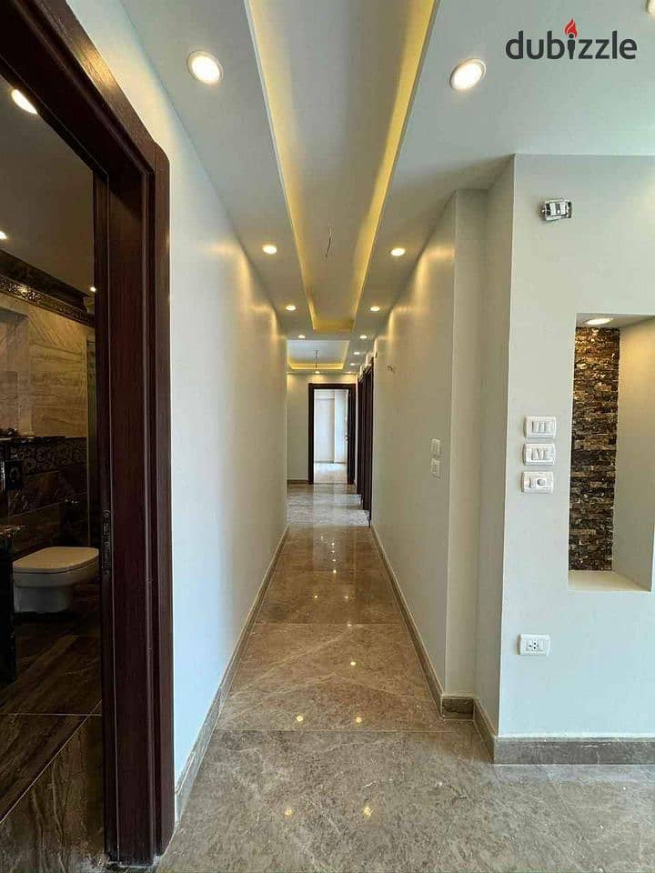 APPARTMENT FULLY FINISHED WITH AC AND KITCHEN FOR SALE IN COMPOUND VALORE SHERATON IN FRONT OF CITY CENTRE ALMAZA  WITH INSTALLEMENT 4