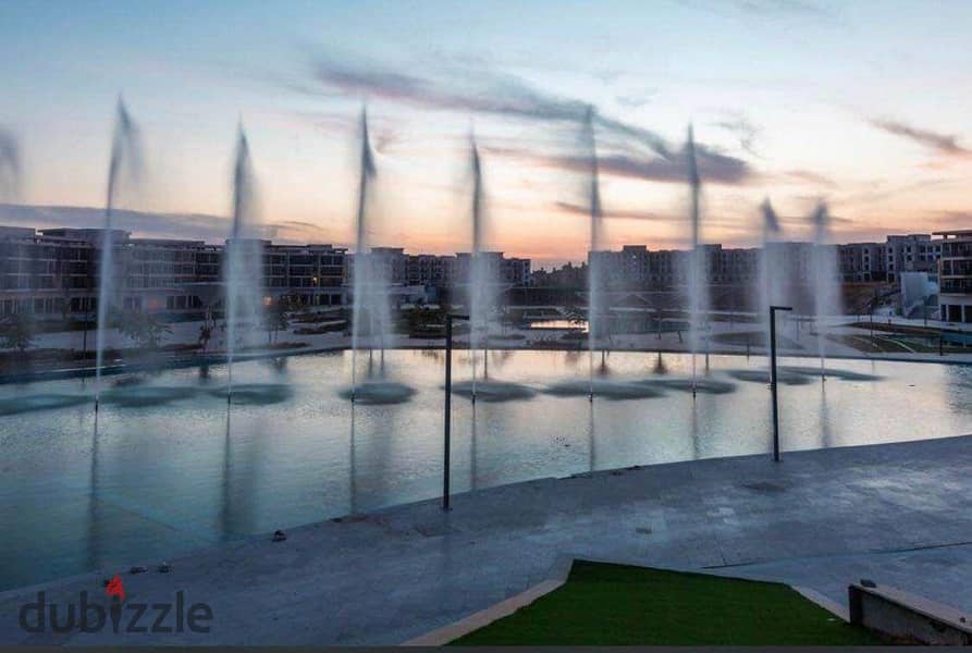 View and receive immediately a twin villa with a dancing fountain view in Sheikh Zayed behind Mall of Arabia, in installments 1