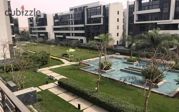 Apartment for sale in Creek Town New Cairo Compound, on the Suez Road, minutes from Madinaty, near Saada Compound, near Al-Rehab, and close to Swan La 12