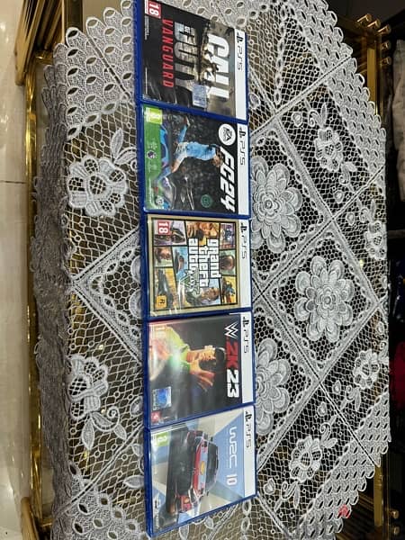 ps5 slim cd with 5 cd - 2 ذراع 1