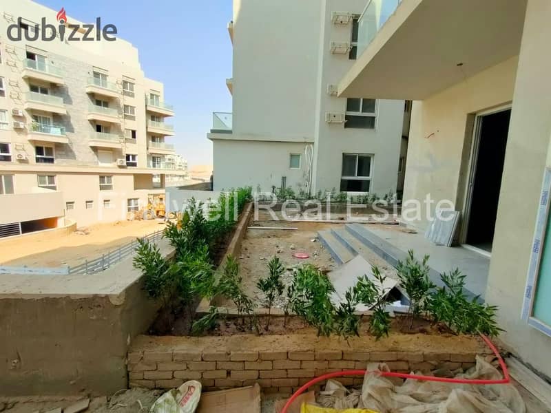 Mountain View iCity Compound - New Cairo  شقة أرضي متشطبة للبيع في ماونتن فيو اي سيتي القاهرة الجديدة بسعر لقطة 1