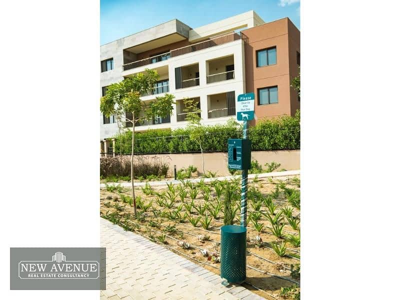 Delivered Apartment Terrace overlooking the landscape and club in District 5 Marakez New Cairo 10