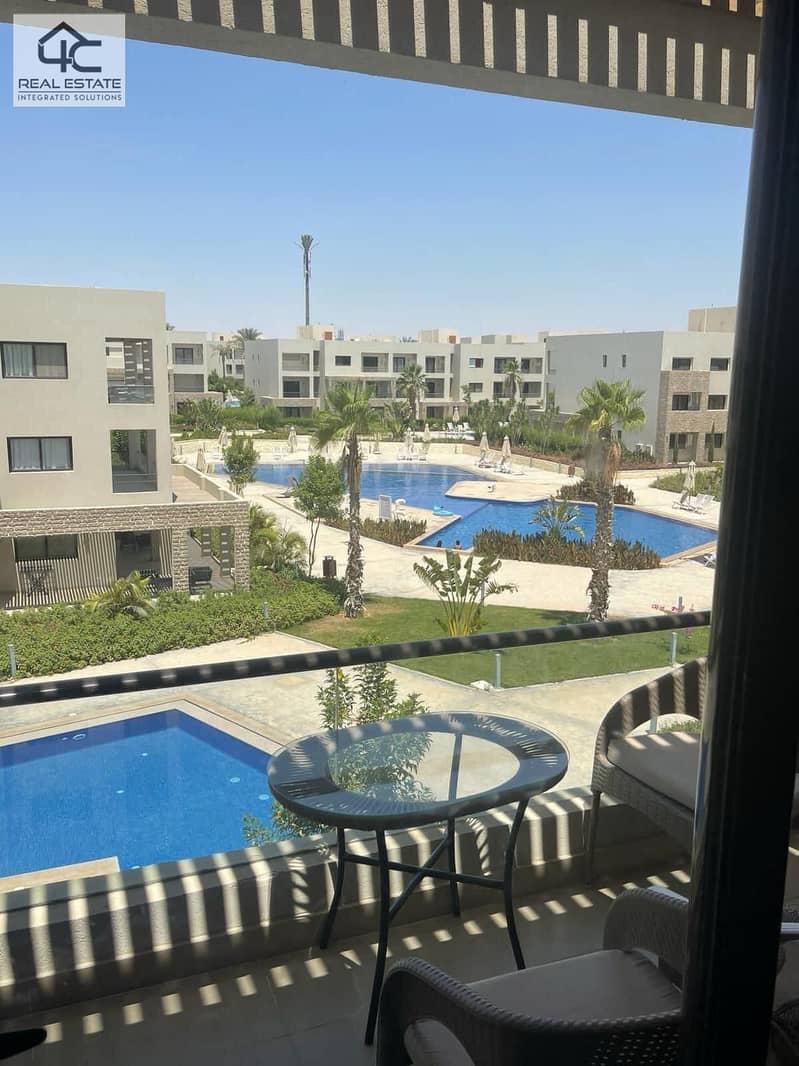 WITH the lowest price in Azha, own a finished duplex with AC and a kitchen,  double view on the largest Crystal Lagoon and directly to the sea 2