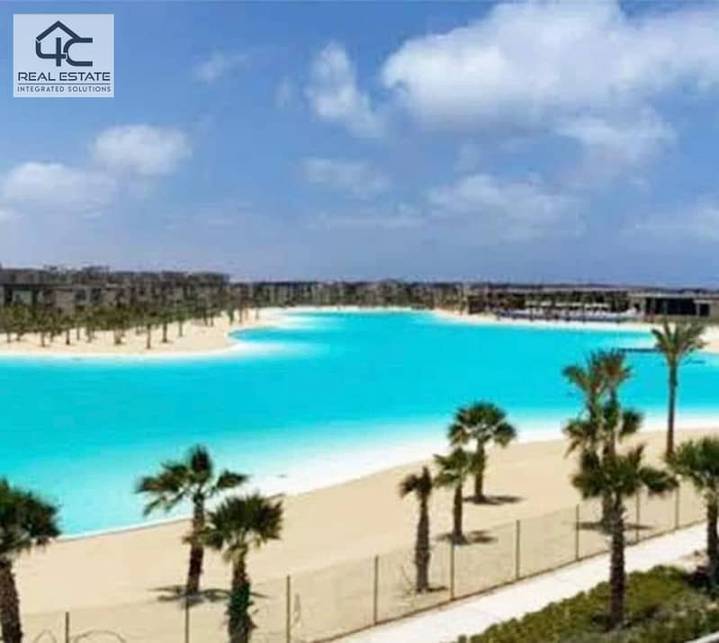 WITH the lowest price in Azha, own a finished duplex with AC and a kitchen,  double view on the largest Crystal Lagoon and directly to the sea 23