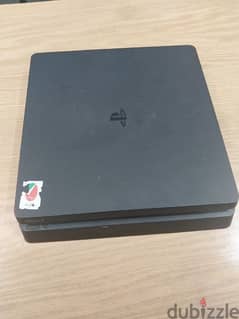 Used like new PS4 slim with cable and 2 controllers with charging deck