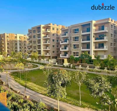 Apartment for sale in installments on a very special view on the landscape in front of Cairo Airport in the Taj City compound along Heliopolis