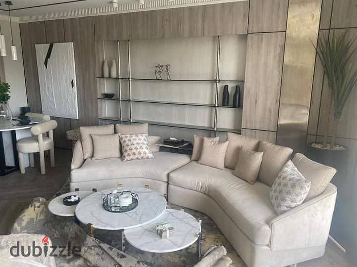 Apartment for sale in installments on a very special view on the landscape in front of Cairo Airport in the Taj City compound along Heliopolis 1