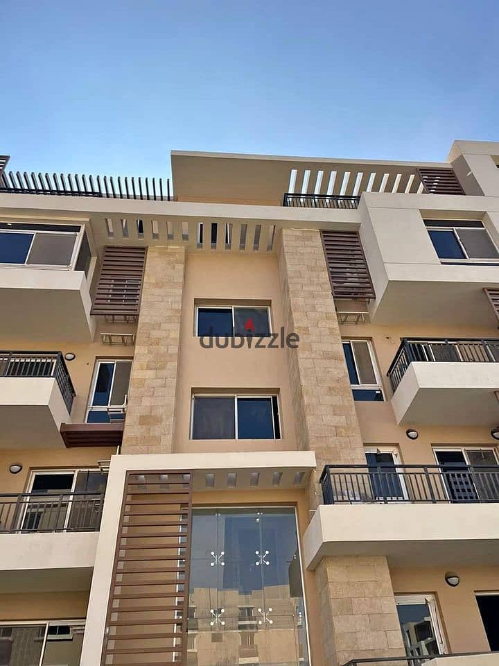 Apartment for sale in installments on a very special view on the landscape in front of Cairo Airport in the Taj City compound along Heliopolis 8