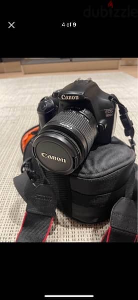 canon EOS 1100D with lens 18-55 mm 3