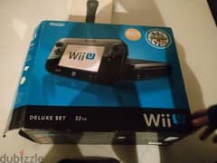 wii U deluxe 32 GB جديد يعتبر مستغدمش