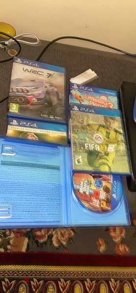 PlayStation 4 slim 1 Tb with 2 controllers and 5 games 1