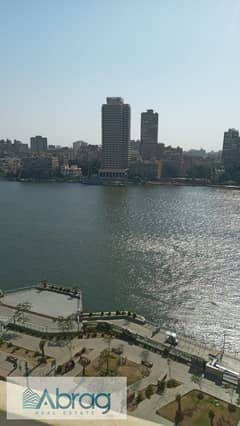 For sale, apartment of 335 meters, with finishing and air conditioning, directly on the Nile