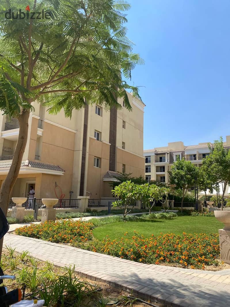 For sale after a 42% discount, a two-bedroom apartment with a garden in front of Cairo Airport and next to the Marriott Hotel in Taj City, New Cairo 5