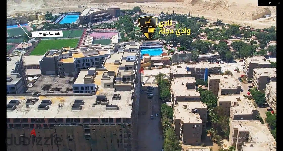 Shop for sale, 55 meters, on the project plaza, on the facade, the heart of Zahraa Maadi, in front of Wadi Degla Club and next to Maadi Valley Compoun 18