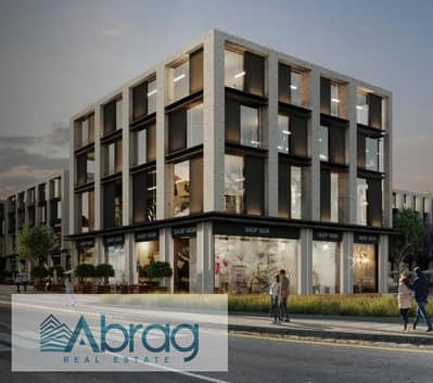 For sale, a ground floor commercial store, 97 square meters, 0% down payment, 10-year installments, directly on the axis, Space Mall, Sheikh Zayed