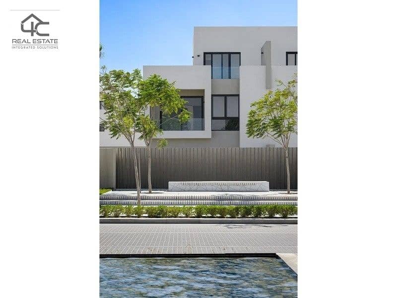 In installments, a middle townhouse with penthouse semi finished with prime view in Al Burouj  Compound 9