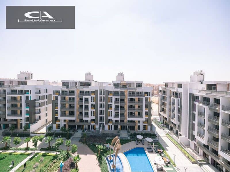 Apartment with Roof for sale in Fifth Settlement, Golden Square, in icon Compound, with only 15% down payment 30% cash DIS | view of the landscape 7