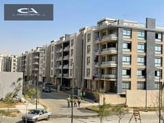 Apartment for sale with roof, 135 meters, in Azad Compound in the heart of Fifth Settlement | Immediate receipt 4/3 finishing | Distinctive view of th