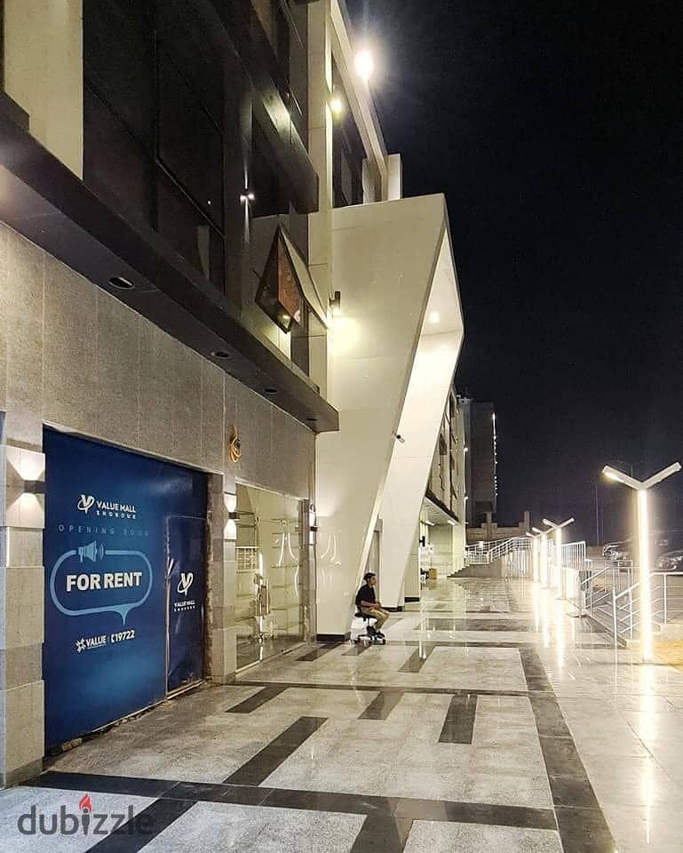 The last store, ground floor, in the largest mall in Shorouk, Value Mall, directly on the facade, 59 m + 55 outdoor space, suitable for a restaurant 12