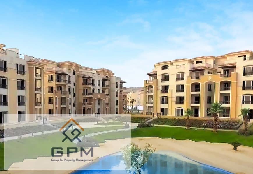 Apartment with private garden for sale in Stone Residence Compound - New Cairo 9