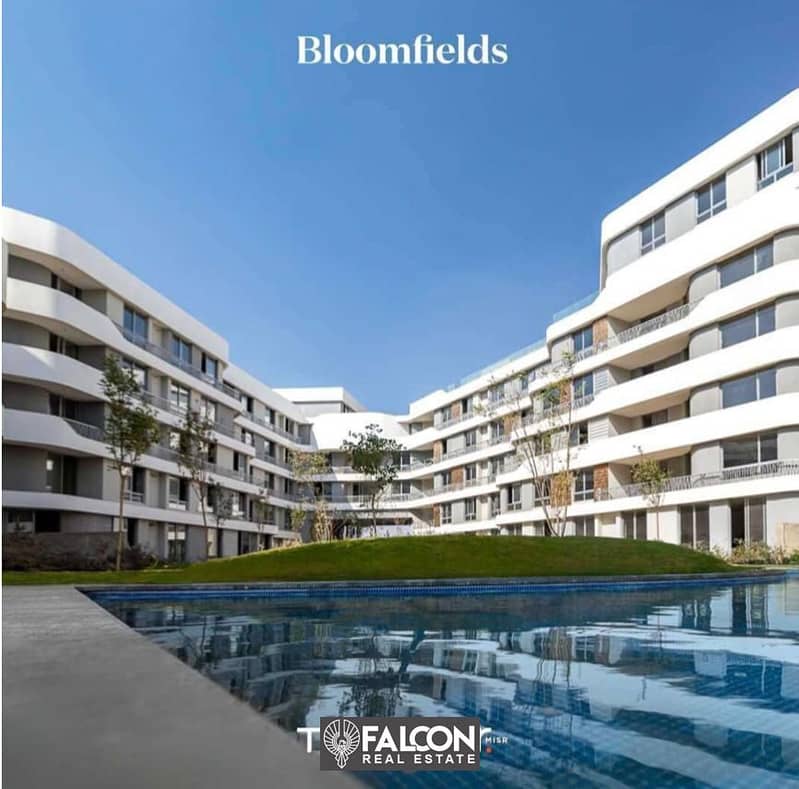 شقة أرضي بجاردن تشطيب كامل في التجمع الخامس في كمبوند بلوم فليدز Bloomfields 2