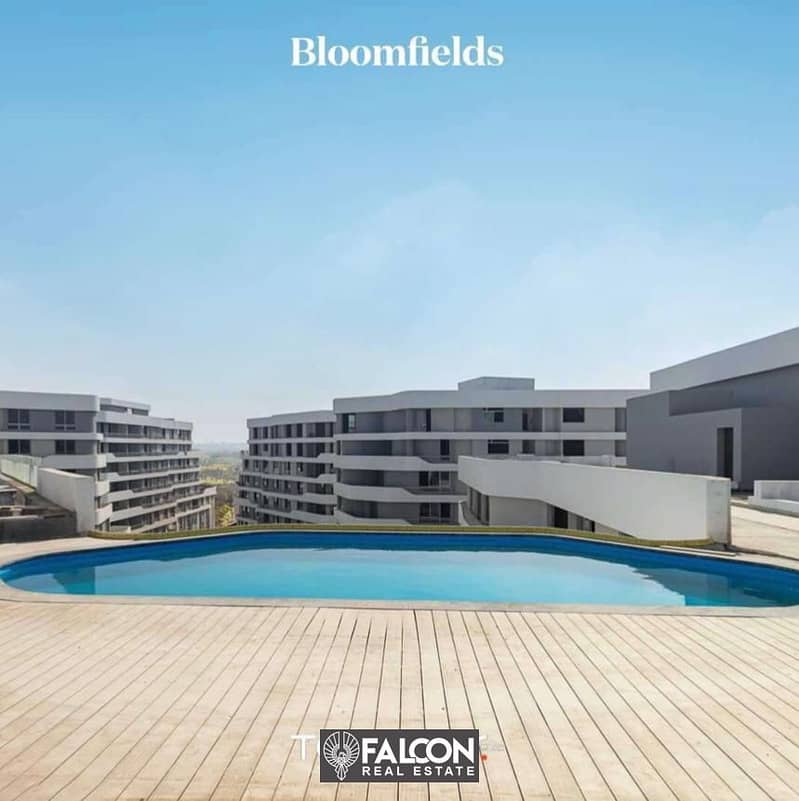 شقة أرضي بجاردن تشطيب كامل في التجمع الخامس في كمبوند بلوم فليدز Bloomfields 3