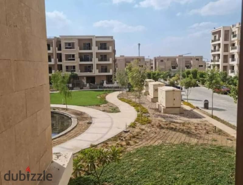 Ground apartment with garden 68 Sqm for sale with 8 years installments Taj City compound Fifth settlement New Cairo 5