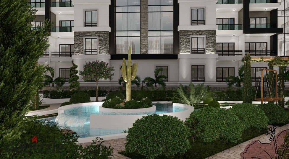 Own a fully finished apartment with a garden in front of ZED Towers, with installments over 8 years, in the heart of old Sheikh Zayed, next to KARMA K 8