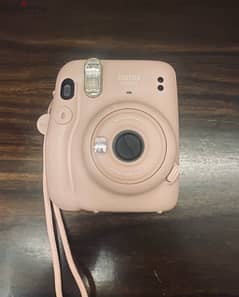 camera instax  mini 11 with its accessories